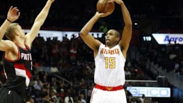 Dec 21, 2015; Atlanta, GA, USA; Atlanta Hawks center Al Horford (15) shoots the ball against the Portland Trail Blazers in the fourth quarter at Philips Arena. The Hawks defeated the Trail Blazers 106-97. Mandatory Credit: Brett Davis-USA TODAY Sports