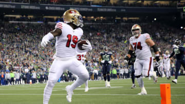 SEATTLE, WASHINGTON - DECEMBER 29: Wide receiver Deebo Samuel #19 of the San Francisco 49ers scores a touchdown against the during the first quarter of the game at CenturyLink Field on December 29, 2019 in Seattle, Washington. (Photo by Abbie Parr/Getty Images)