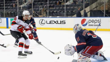 Apr 15, 2021; New York, New York, USA; Igor Shesterkin #31 of the New York Rangers makes the second period save on Jack Hughes #86 of the New Jersey Devils at Madison Square Garden. Mandatory Credit: Bruce Bennett/POOL PHOTOS-USA TODAY Sports