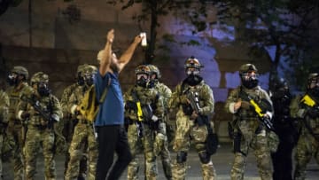 A protester in Portland, Oregon (Photo by Nathan Howard/Getty Images)