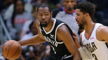 Kevin Durant #7 of the Brooklyn Nets drives against Josh Hart #3 of the New Orleans Pelicans (Photo by Jonathan Bachman/Getty Images)