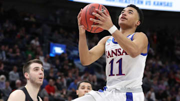 SALT LAKE CITY, UTAH - MARCH 21: Devon Dotson #11 of the Kansas Jayhawks drives to the basket during the second half against the Northeastern Huskies in the first round of the 2019 NCAA Men's Basketball Tournament at Vivint Smart Home Arena on March 21, 2019 in Salt Lake City, Utah. (Photo by Patrick Smith/Getty Images)
