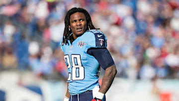 NASHVILLE, TN - DECEMBER 29: Chris Johnson #28 of the Tennessee Titans watches a replay during a game against the Houston Texans at LP Field on December 29, 2013 in Nashville, Tennessee. The Titans defeated the Texans 16-10. (Photo by Wesley Hitt/Getty Images)