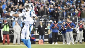 Jan 24, 2016; Charlotte, NC, USA; Carolina Panthers quarterback Cam Newton (1) celebrates during the second quarter against the Arizona Cardinals in the NFC Championship football game at Bank of America Stadium. Mandatory Credit: John David Mercer-USA TODAY Sports