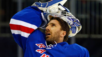 NEW YORK, NY - DECEMBER 15: Henrik Lundqvist #30 of the New York Rangers in action against the Calgary Flames at Madison Square Garden on December 15, 2013 in New York City. The Rangers defeated the Flames 4-3 after a shoot out. (Photo by Jim McIsaac/Getty Images)