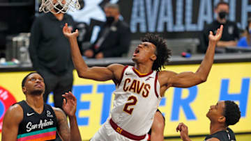 SAN ANTONIO, TX - APRIl 5: Collin Sexton #2 of the Cleveland Cavaliers misses his shot but is fouled by Rudy Gay #22 of the San Antonio Spurs in the second half at AT&T Center on April 5, 2021 in San Antonio, Texas. NOTE TO USER: User expressly acknowledges and agrees that , by downloading and or using this photograph, User is consenting to the terms and conditions of the Getty Images License Agreement. (Photo by Ronald Cortes/Getty Images)