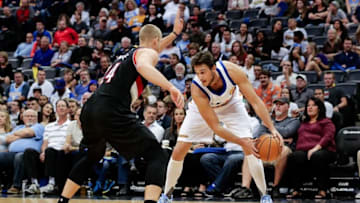 Oct 29, 2016; Denver, CO, USA; Denver Nuggets forward Danilo Gallinari (8) controls the ball as Portland Trail Blazers forward Mason Plumlee (24) defends in the second quarter at the Pepsi Center. Mandatory Credit: Isaiah J. Downing-USA TODAY Sports