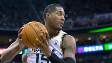 Jan 13, 2014; Salt Lake City, UT, USA; Utah Jazz power forward Derrick Favors (15) looks to pass during the first half against the Denver Nuggets at EnergySolutions Arena. Mandatory Credit: Russ Isabella-USA TODAY Sports