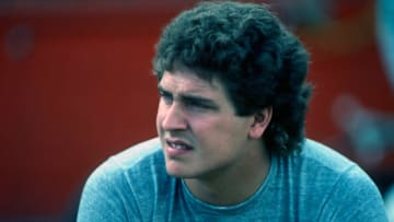 MIAMI, FL - DECEMBER 29: Quarterback Dan Marino of the Miami Dolphins looks on from the sideline before pregame warm up prior to a playoff game against the Seattle Seahawks at the Orange Bowl on December 29, 1984 in Miami, Florida. Miami defeated Seattle 31-10. (Photo by George Gojkovich/Getty Images)