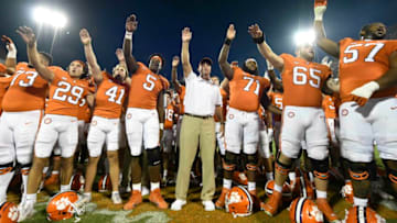 Sep 11, 2021; Clemson, South Carolina, USA; Clemson Tigers head coach Dabo Swinney sings the Alma Mater with his team after defeating South Carolina State Bulldogs at Memorial Stadium. Mandatory Credit: Adam Hagy-USA TODAY Sports