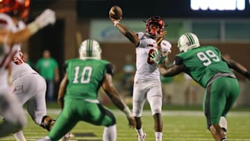 Sep 24, 2016; Huntington, WV, USA; Louisville Cardinals quarterback Lamar Jackson (8) throws a pass for a touchdown to tight end Cole Hikutini (not pictured) against the Marshall Thundering Herd in the first half at Joan C. Edwards Stadium. Mandatory Credit: Aaron Doster-USA TODAY Sports
