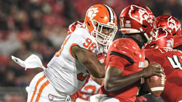 Clemson defensive end Myles Murphy (98) pressures Louisville quarterback Malik Cunningham (3) during the second quarter at Cardinal Stadium in Louisville, Kentucky Saturday, November 6, 2021.Ncaa Football Clemson At Louisville