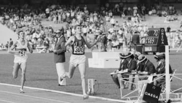 Jim Ryun of the United States crosses the line to take silver ahead of Bodo Tummler of West Germany in the Men's 1,500 metres event of the XIX Summer Olympic Games on 20th October 1968.(Photo by Tony Duffy/Getty Images)