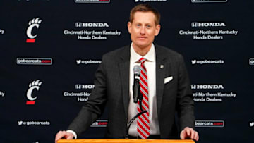 John Cunningham delivers remarks in press conference at Fifth Third Arena. The Enquirer.