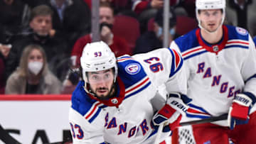 MONTREAL, QC - OCTOBER 16: Mika Zibanejad #93 of the New York Rangers skates the puck against the Montreal Canadiens during the third period at Centre Bell on October 16, 2021 in Montreal, Canada. The New York Rangers defeated the Montreal Canadiens 3-1. (Photo by Minas Panagiotakis/Getty Images)