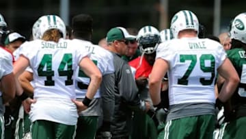 Jul 24, 2014; Cortland, NY, USA; New York Jets head coach Rex Ryan (center) talks with his team following training camp at SUNY Cortland. Mandatory Credit: Rich Barnes-USA TODAY Sports