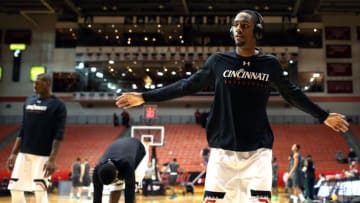 Jan 24, 2016; Cincinnati, OH, USA; Cincinnati Bearcats guard Farad Cobb (21) stretches prior to the game against the Tulane Green Wave at Fifth Third Arena. Mandatory Credit: Aaron Doster-USA TODAY Sports