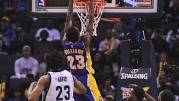 Dec 3, 2016; Memphis, TN, USA; Los Angeles Lakers guard Louis Williams (23) dunks the ball against Memphis Grizzlies forward Deyonta Davis (23) during the first half at FedExForum. Mandatory Credit: Justin Ford-USA TODAY Sports