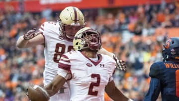 SYRACUSE, NY - NOVEMBER 25: AJ Dillon #2 of the Boston College Eagles celebrates a touchdown during the first quarter that makes the score 14-7 Boston College leading Syracuse Orange at the Carrier Dome on November 25, 2017 in Syracuse, New York. (Photo by Brett Carlsen/Getty Images)