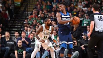 BOSTON, MA - JANUARY 5: Jimmy Butler #23 of the Minnesota Timberwolves handles the ball against Kyrie Irving #11 of the Boston Celtics on January 5, 2018 at the TD Garden in Boston, Massachusetts. NOTE TO USER: User expressly acknowledges and agrees that, by downloading and or using this photograph, User is consenting to the terms and conditions of the Getty Images License Agreement. Mandatory Copyright Notice: Copyright 2018 NBAE (Photo by Brian Babineau/NBAE via Getty Images)
