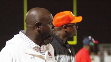 Auburn football defensive lineman coach Nick Eason and Clemson University's Todd Bates, also a defensive lineman coach, watch as Pike Road plays Andalusia at home on September 10, 2021.091021 Pike Road V Andalusia