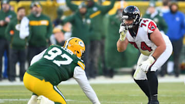 GREEN BAY, WISCONSIN - DECEMBER 09: Ty Sambrailo #74 of the Atlanta Falcons works against Kenny Clark #97 of the Green Bay Packers during a game at Lambeau Field on December 09, 2018 in Green Bay, Wisconsin. The Packers defeated the Falcons 34-20. (Photo by Stacy Revere/Getty Images)