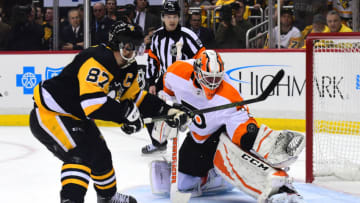 PITTSBURGH, PA - APRIL 13: Brian Elliott #37 of the Philadelphia Flyers makes a save on Sidney Crosby #87 of the Pittsburgh Penguins in Game Two of the Eastern Conference First Round during the 2018 NHL Stanley Cup Playoffs at PPG PAINTS Arena on April 13, 2018 in Pittsburgh, Pennsylvania. (Photo by Matt Kincaid/Getty Images)