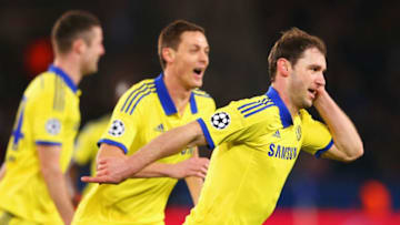 PARIS, FRANCE - FEBRUARY 17: Branislav Ivanovic of Chelsea (R) celebrates with Nemanja Matic as he scores their first goal during the UEFA Champions League Round of 16 match between Paris Saint-Germain and Chelsea at Parc des Princes on February 17, 2015 in Paris, France. (Photo by Alex Livesey/Getty Images)