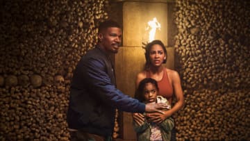 DAY SHIFT. (L to R) Jamie Foxx as Bud, Zion Broadnax as Paige and Meagan Good as Jocelyn in Day Shift. Cr. Parrish Lewis/Netflix © 2022