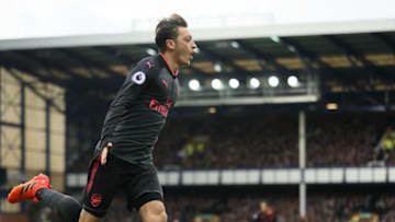 Mesut Ozil of Arsenal celebrates (Photo by Matthew Ashton - AMA/Getty Images)
