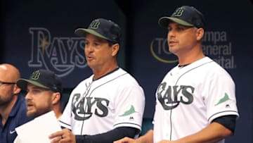 ST. PETERSBURG, FL - MAY 26: Coach Rocco Baldelli (15), Coach Charlie Montoyo (25) and Manager Kevin Cash (16) of the Rays watch the action on the field during the MLB regular season game between the Baltimore Orioles and the Tampa Bay Rays on May 26, 2018, at Tropicana Field in St. Petersburg, FL. (Photo by Cliff Welch/Icon Sportswire via Getty Images)
