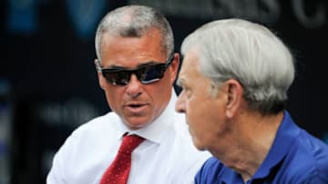 KANSAS CITY, MO - AUGUST 9: Kansas City Royals general manager Dayton Moore and owner David Glass talk during batting practice prior to a game against the Chicago White Sox at Kauffman Stadium on August 9, 2016 in Kansas City, Missouri. (Photo by Ed Zurga/Getty Images)