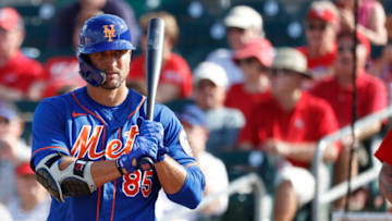 JUPITER, FL - MARCH 05: Tim Tebow #85 of the New York Mets looks on before stepping to the plate to bat against the St Louis Cardinals during a Grapefruit League spring training game at Roger Dean Stadium on March 5, 2020 in Jupiter, Florida. The game ended in a 7-7 tie. (Photo by Joe Robbins/Getty Images)