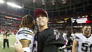 Oct 23, 2016; Atlanta, GA, USA; Atlanta Falcons quarterback Matt Ryan (2) greets San Diego Chargers strong safety Dexter McCoil (23) after their game at the Georgia Dome. The Chargers won 33-30 in overtime. Mandatory Credit: Jason Getz-USA TODAY Sports