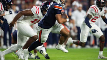 Auburn football quarterback Robby Ashford (9) runs the ball as Auburn Tigers take on Mississippi Rebels at Jordan-Hare Stadium in Auburn, Ala., on Saturday, Oct. 21, 2023. Mississippi Rebels defeated Auburn Tigers 28-21.
