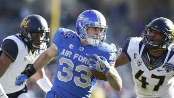 Dec 29, 2015; Fort Worth, TX, USA; Air Force Falcons running back Timothy McVey (33) runs the ball against California Golden Bears linebacker Hardy Nickerson (47) in the second quarter at Amon G. Carter Stadium. Mandatory Credit: Tim Heitman-USA TODAY Sports