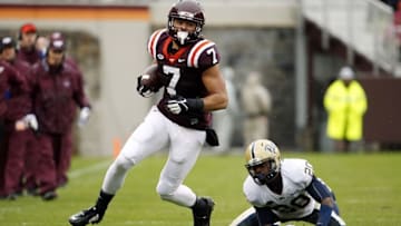 Oct 3, 2015; Blacksburg, VA, USA; Virginia Tech Hokies tight end Bucky Hodges (7) runs the ball after a catch against Pittsburgh Panthers defensive back Dennis Briggs (20) during the second quarter at Lane Stadium. Mandatory Credit: Peter Casey-USA TODAY Sports