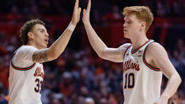CHAMPAIGN, IL - FEBRUARY 11: Coleman Hawkins #33 of the Illinois Fighting Illini and Luke Goode #10 of the Illinois Fighting Illini celebrate during the second half against the Rutgers Scarlet Knights at State Farm Center on February 11, 2023 in Champaign, Illinois. (Photo by Michael Hickey/Getty Images)