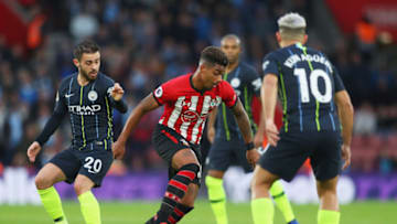 SOUTHAMPTON, ENGLAND - DECEMBER 30: Mario Lemina of Southampton takes on Bernardo Silva and Sergio Aguero of Manchester City during the Premier League match between Southampton FC and Manchester City at St Mary's Stadium on December 29, 2018 in Southampton, United Kingdom. (Photo by Catherine Ivill/Getty Images)
