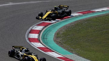 SHANGHAI, CHINA - APRIL 15: Nico Hulkenberg of Germany driving the (27) Renault Sport Formula One Team RS18 leads Carlos Sainz of Spain driving the (55) Renault Sport Formula One Team RS18 (Photo by Charles Coates/Getty Images)