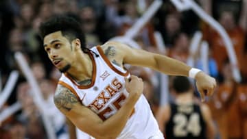 AUSTIN, TX - DECEMBER 9: Elijah Mitrou-Long #55 of the Texas Longhorns reacts as the Texas Longhorns defeat the Purdue Boilermakers at the Frank Erwin Center on December 9, 2018 in Austin, Texas. (Photo by Chris Covatta/Getty Images)