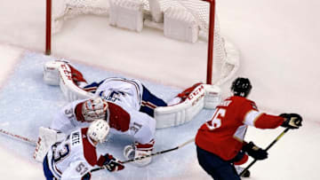 SUNRISE, FL - FEBRUARY 17: Aleksander Barkov #16 of the Florida Panthers scores against Goaltender Carey Price #31 of the Montreal Canadiens in the second period at the BB&T Center on February 17, 2019 in Sunrise, Florida. (Photo by Eliot J. Schechter/NHLI via Getty Images)