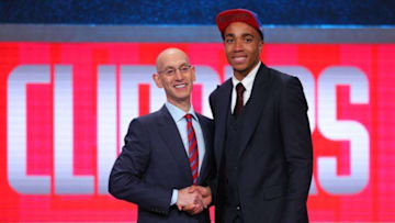 Jun 23, 2016; New York, NY, USA; Brice Johnson (North Carolina) greets NBA commissioner Adam Silver after being selected as the number twenty-five overall pick to the Los Angeles Clippers in the first round of the 2016 NBA Draft at Barclays Center. Mandatory Credit: Brad Penner-USA TODAY Sports