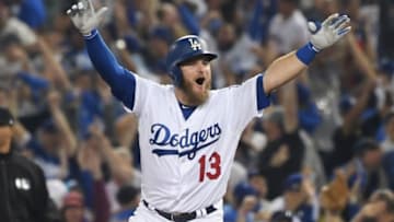 LOS ANGELES, CA - OCTOBER 26: Max Muncy #13 of the Los Angeles Dodgers celebrates his eighteenth inning walk-off home run to defeat the the Boston Red Sox 3-2 in Game Three of the 2018 World Series at Dodger Stadium on October 26, 2018 in Los Angeles, California. (Photo by Harry How/Getty Images)