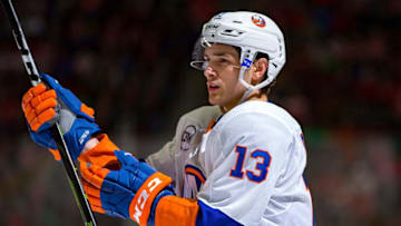 DETROIT, MI - MARCH 16: Mathew Barzal #13 of the New York Islanders gets set for the face-off against the Detroit Red Wings during an NHL game at Little Caesars Arena on March 16, 2019 in Detroit, Michigan. The Red Wings defeated the Islanders 2-1. (Photo by Dave Reginek/NHLI via Getty Images)