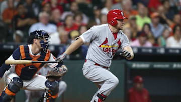 Aug 16, 2016; Houston, TX, USA; St. Louis Cardinals first baseman Brandon Moss (37) hits an RBI single during the first inning against the Houston Astros at Minute Maid Park. Mandatory Credit: Troy Taormina-USA TODAY Sports