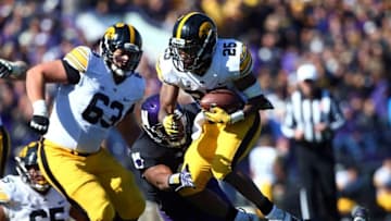 Oct 17, 2015; Evanston, IL, USA; Iowa Hawkeyes running back Akrum Wadley (25) runs with the ball against the Northwestern Wildcats during the second half at Ryan Field. Mandatory Credit: Jerry Lai-USA TODAY Sports