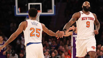 Dec 4, 2016; New York, NY, USA; New York Knicks center Kyle O'Quinn (9) celebrates his basket with guard Derrick Rose (25) during the first quarter at Madison Square Garden. Mandatory Credit: Anthony Gruppuso-USA TODAY Sports