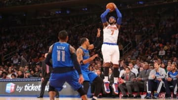 Feb 24, 2014; New York, NY, USA; New York Knicks small forward Carmelo Anthony (7) shoots the ball during the third quarter against the Dallas Mavericks at Madison Square Garden. Dallas Mavericks won 110-108. Mandatory Credit: Anthony Gruppuso-USA TODAY Sports