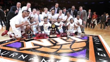 Apr 3, 2014; New York, NY, USA; The Minnesota Golden Gophers players celebrate after defeating the Southern Methodist Mustangs 65-63 in the 2014 NIT Tournament championship game at Madison Square Garden. Mandatory Credit: Adam Hunger-USA TODAY Sports